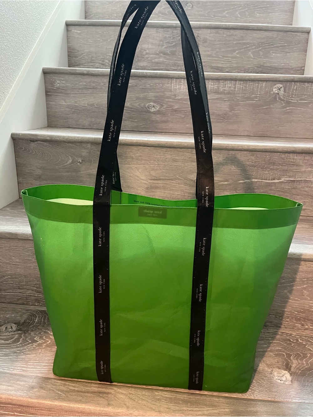 kate spade bright green shopping tote with black logo straps